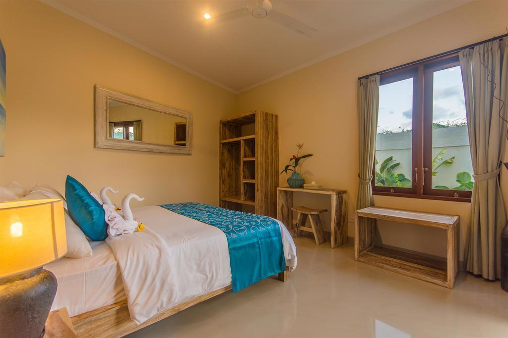 Villa Tepi Sungai Legian Pokoj fotografie
